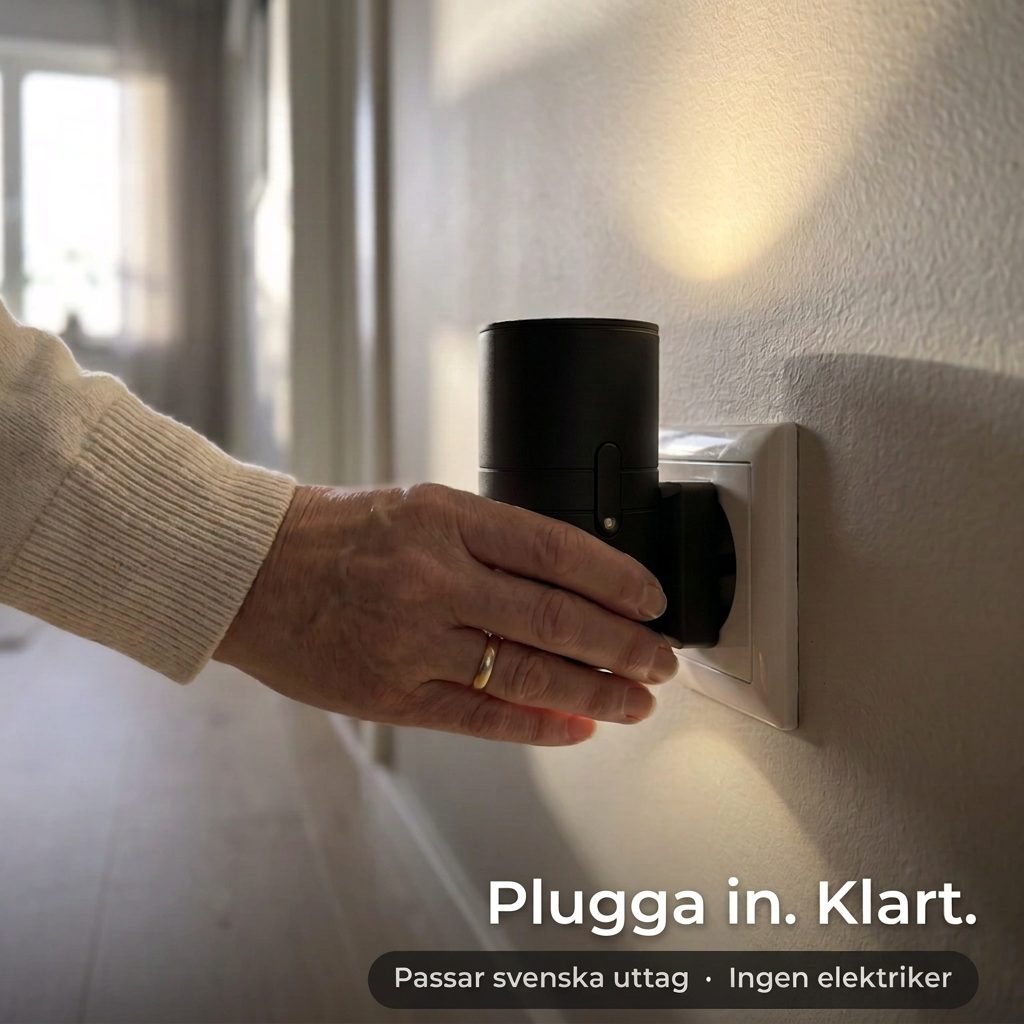 Hand som pluggar in Luma vägglampa i uttaget – plugga in, klart